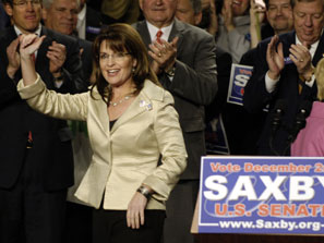 Alaska Gov. Sarah Palin, center, waves to a crowd during a campaign stop for U.S. Sen. Saxby Chambli