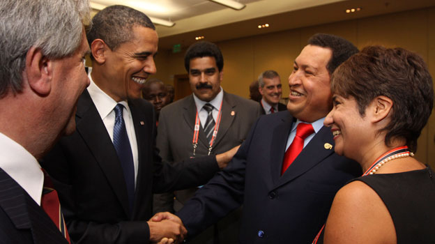 President Barack Obama shakes hands with Hugo Chavez