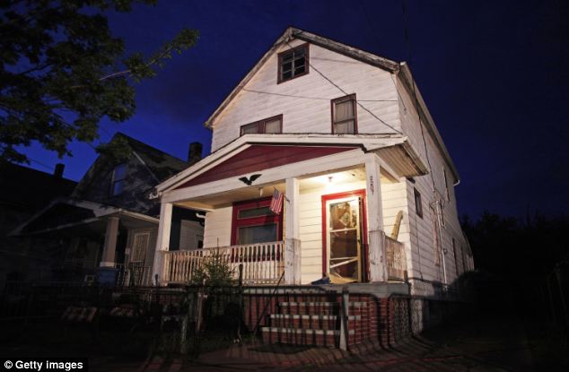 Escape: A neighbor managed to kick down a door at the home, pictured, freeing the women