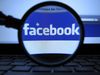** FILE ** In this Oct. 10, 2011, file photo, a magnifying glass is posed over a monitor displaying a Facebook page in Munich. Regulators are examining whether Morgan Stanley, the investment bank that shepherded Facebook through its highly publicized stock offering last week, selectively informed clients of an analyst's negative report about the company before the stock started trading. (AP Photo/dapd, Joerg Koch)