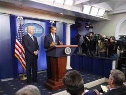 President Obama and Vice President Joe Biden make a statement regarding the passage of the fiscal cliff bill in the Brady Press Briefing Room at the White House in Washington, Wednesday, Jan. 2, 2013. (AP Photo/Charles Dharapak)